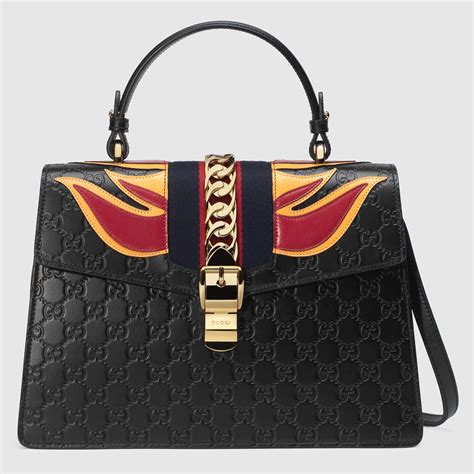 gucci logo pattern bag|Gucci signature bag.